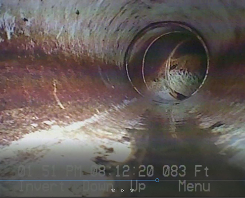 The inside of a homes clearly flowing sewer pipe during a sewer scope inspection