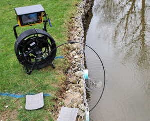 A storm drain inspection of a drainage pipe that drains into a backyard creek